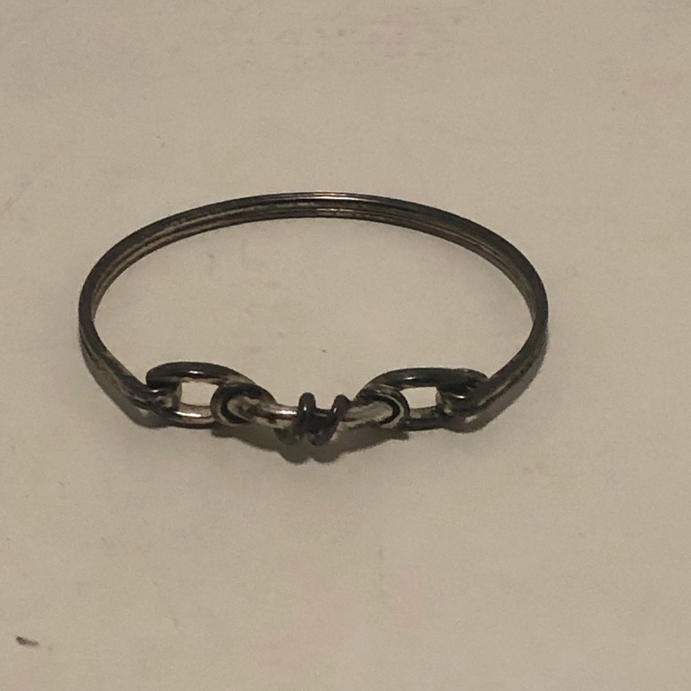 Elegant Silver Tone Knot Bracelet